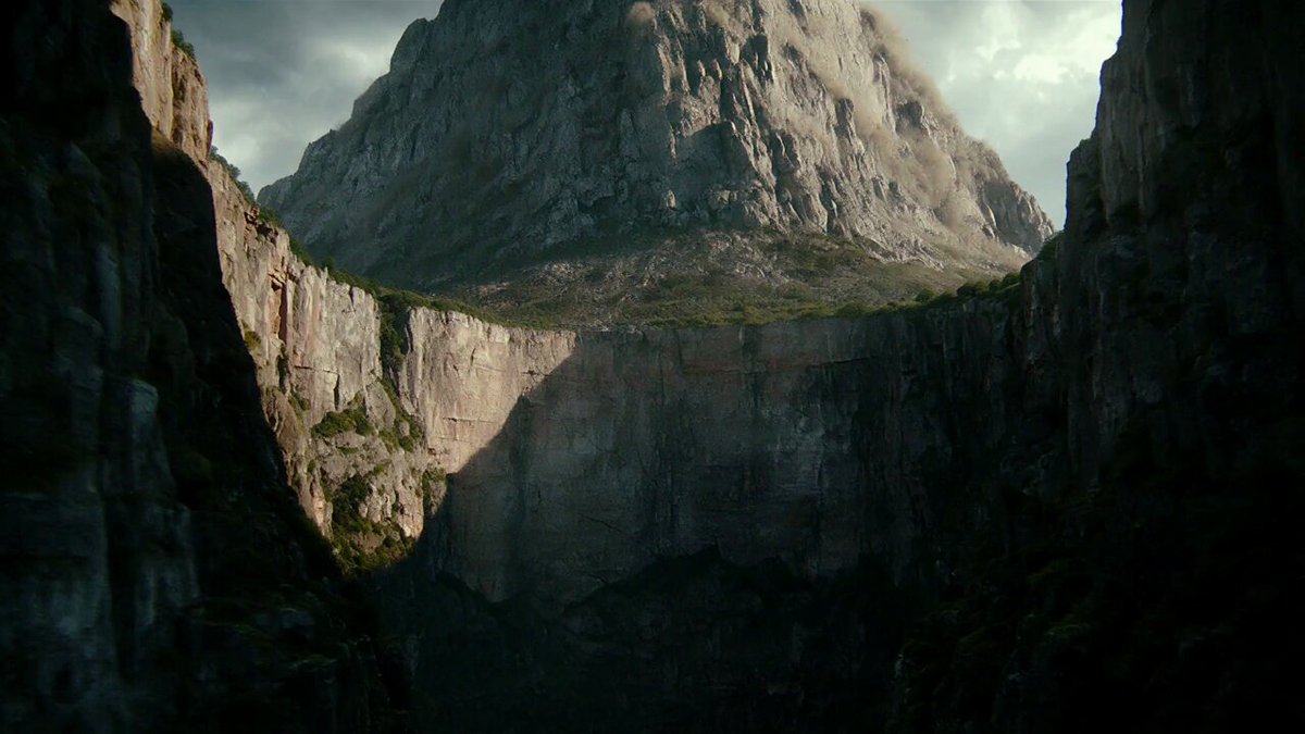 Collapsing mountain cinematic typography sequence