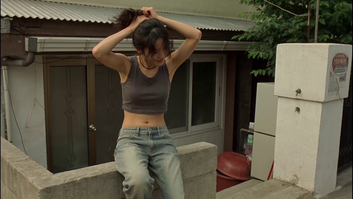 Young Korean woman in residential neighborhood
