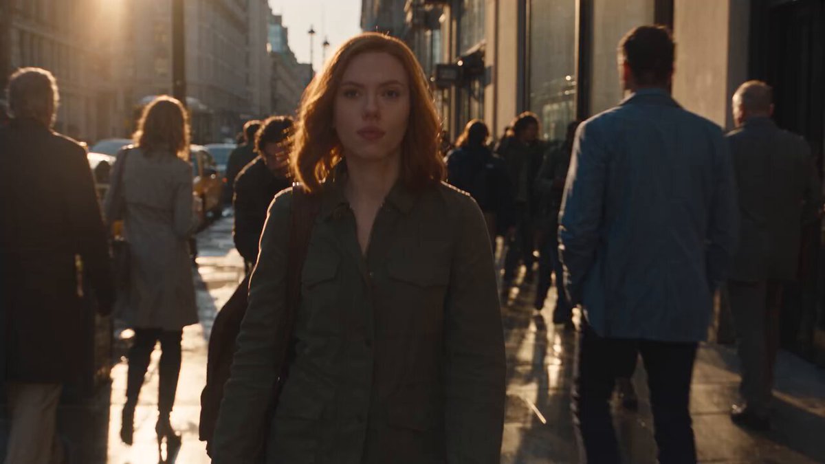 Cinematic live-action thriller scene on a downtown street