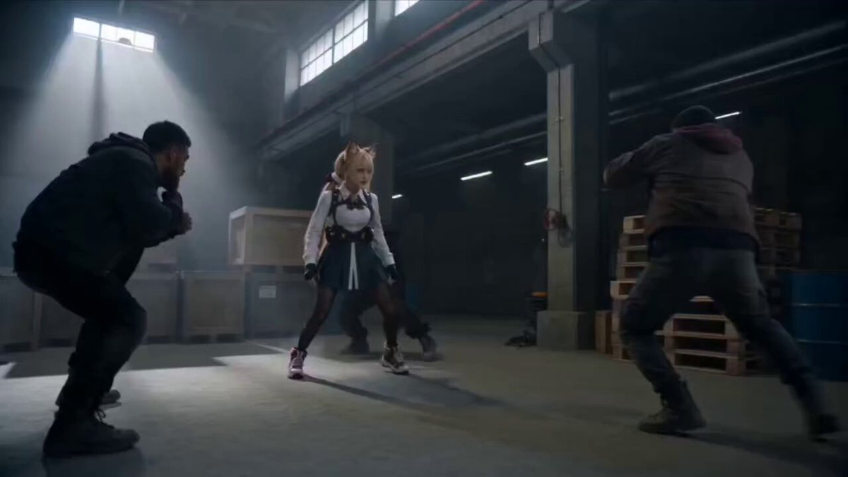 Nine-tailed fox warrior fighting in a warehouse