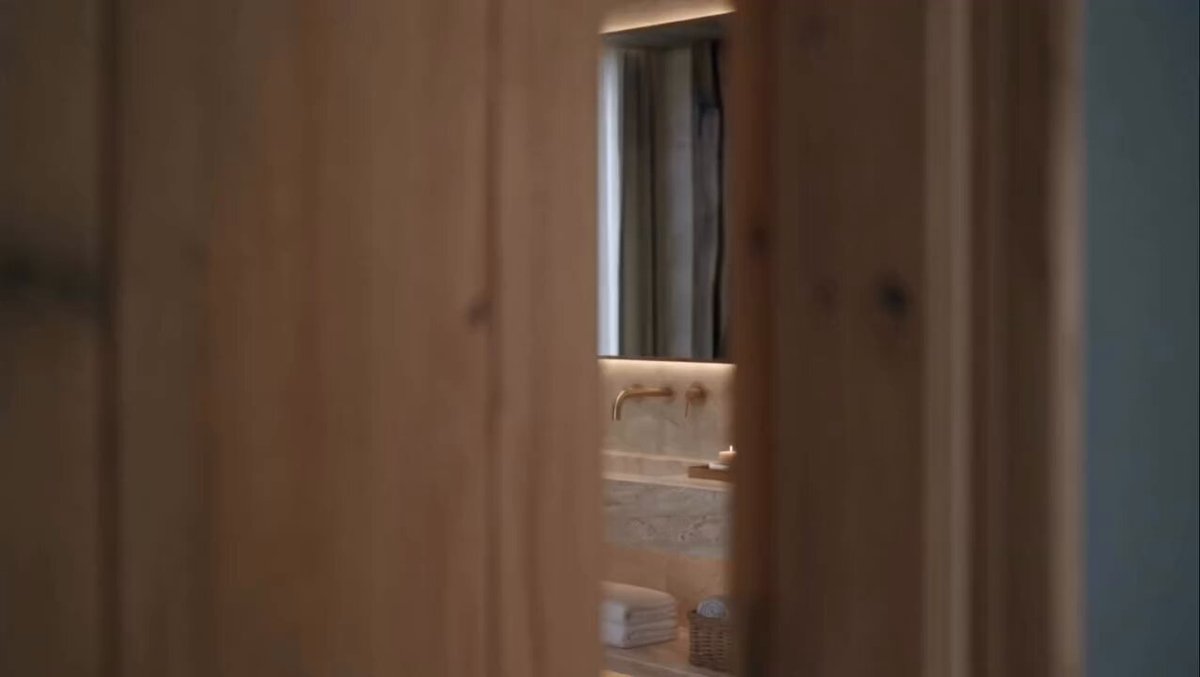 Luxury mascara beauty commercial in modern bathroom